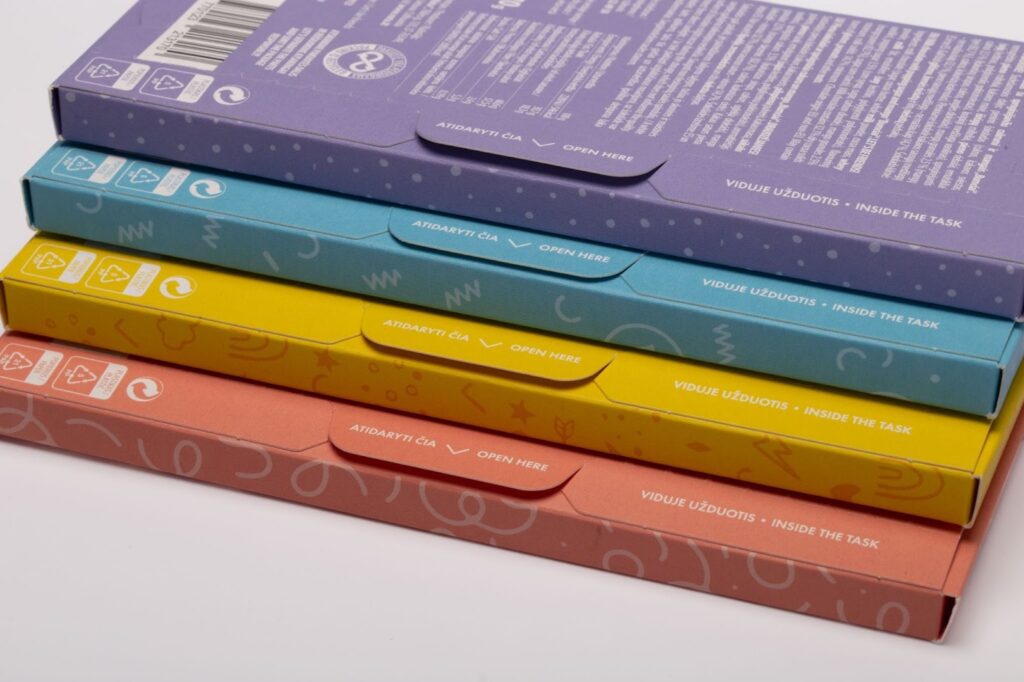 Dėžutės su spauda: kaip pakuotės kuria ir didina prekės ženklo vertę